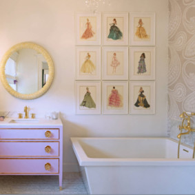 Gold plated faucet over acrylic bathtub