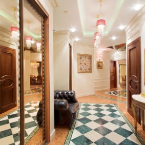 Leather armchair in the hallway of the apartment