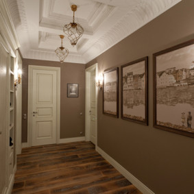 Pictures in the interior of a long hallway