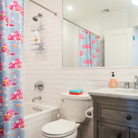 Large mirror in a small bathroom