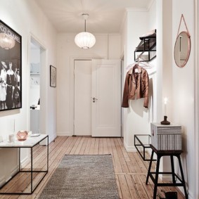 Gray rug on the wooden floor