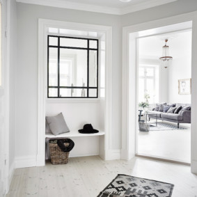 Spacious entrance hall with white walls