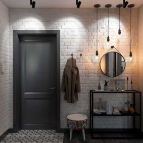 Hallway lighting with gray door