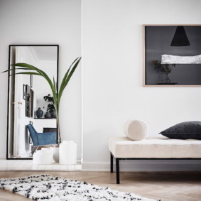 Rectangular mirror on a white wall