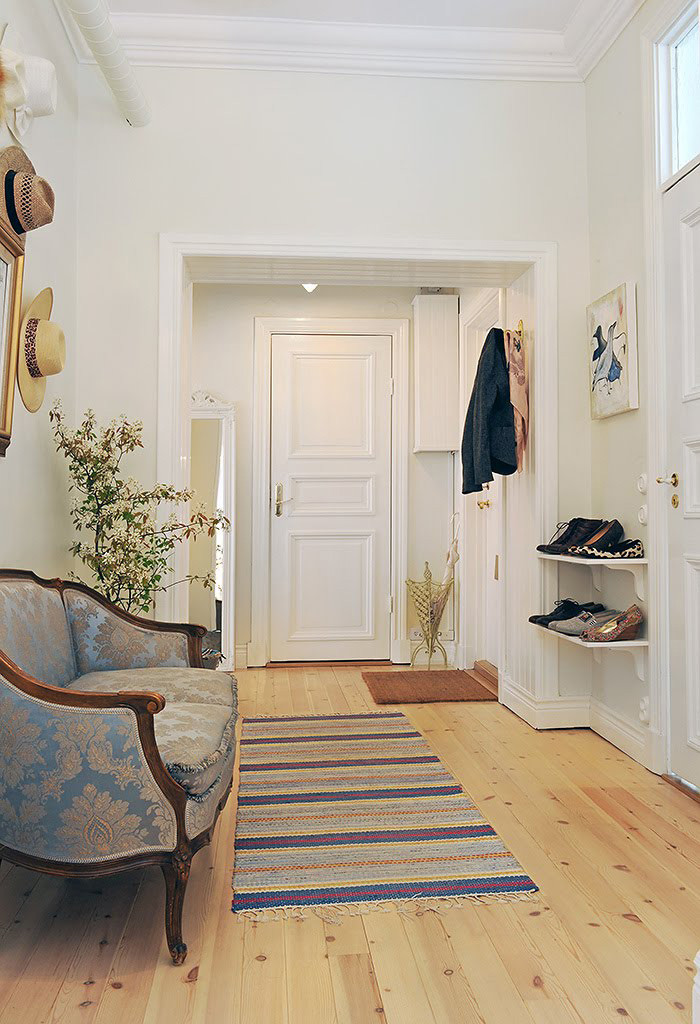 Upholstered furniture in a spacious hall of scandi