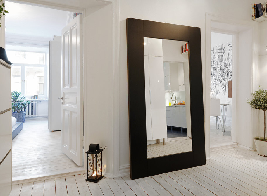 rectangular wall mirror in the hallway