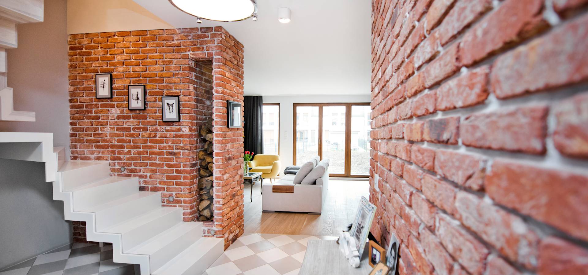 wallpaper under the brick in the hallway design ideas