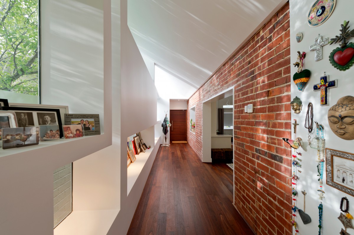 wallpaper under a brick in the hallway interior ideas