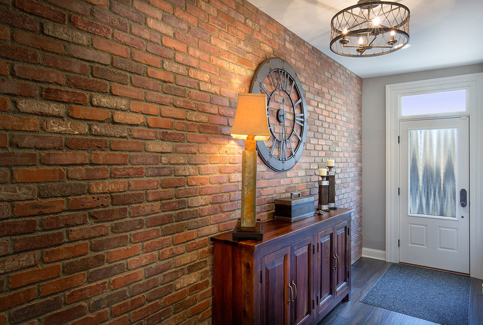 wallpaper under a brick in the hallway interior