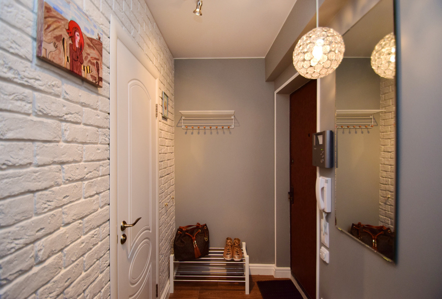 modern style entrance hall with brick trim