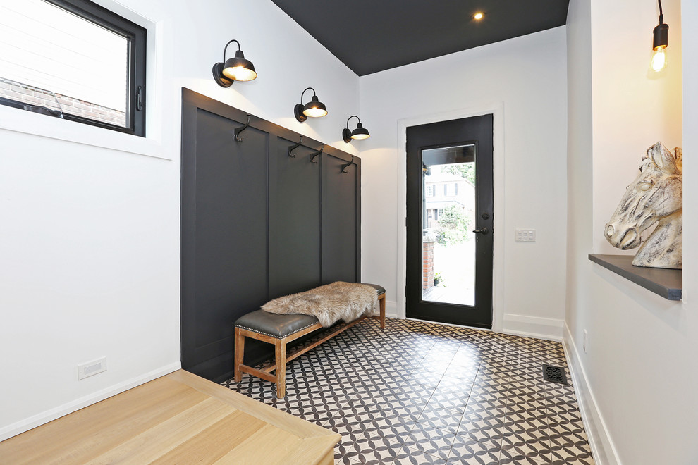 Gray closet in the hallway with ceramic floor