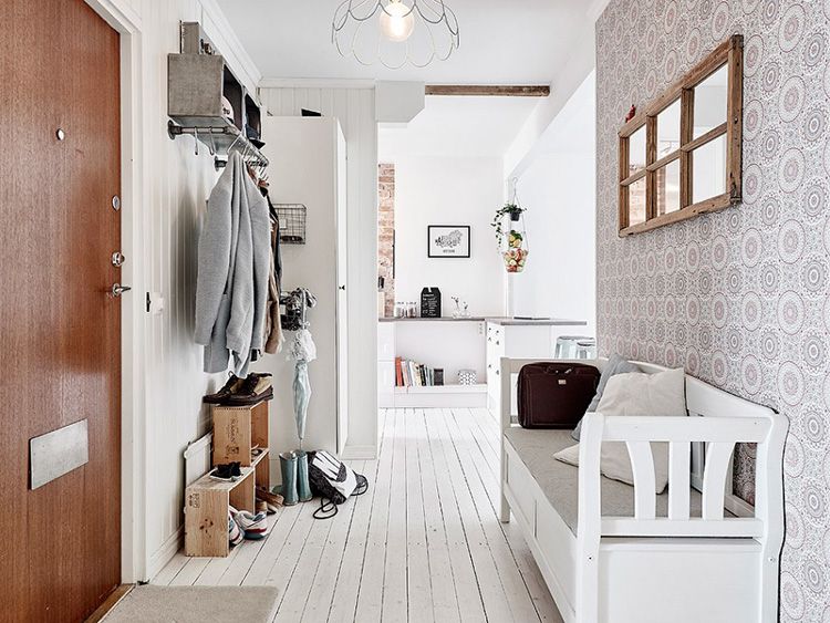 Comfortable bench in the hallway with an open hanger