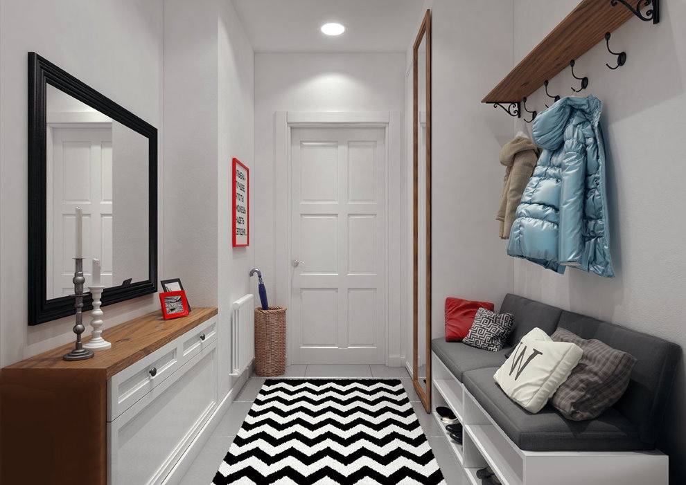 White and black rug on the floor of the corridor in the apartment