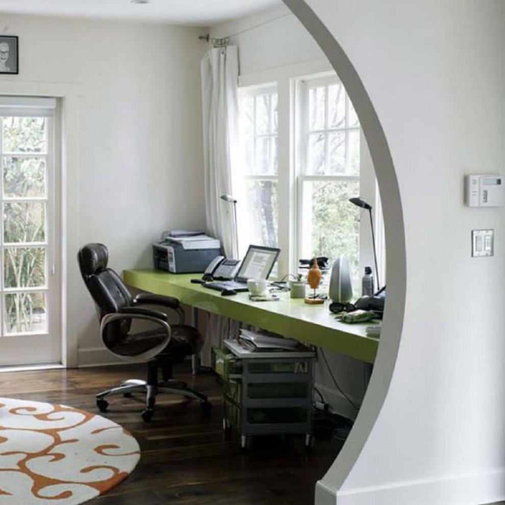 Computer desk near bedroom window