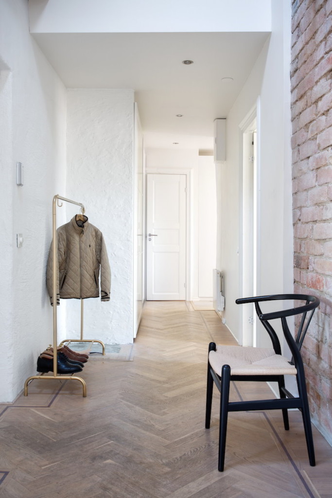 Narrow entrance hall of a loft style apartment