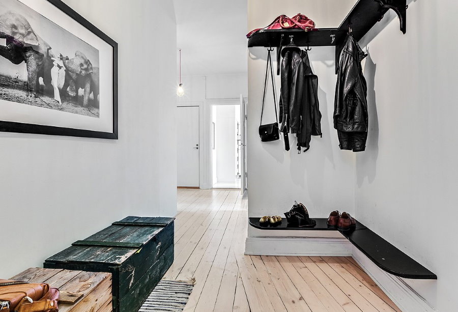 Drawers on the floor of a Scandinavian hallway