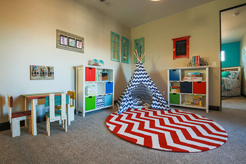 chambre d'enfants avec aire de jeux