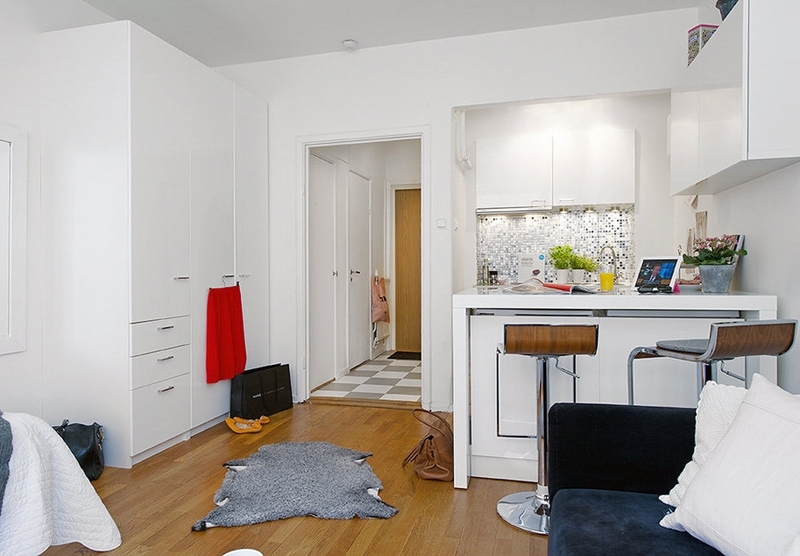 kitchen in a studio apartment of 28 sq m