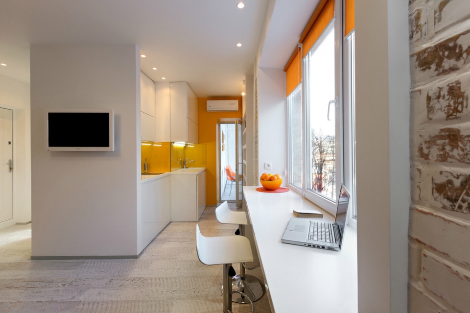 workplace on the balcony in a studio apartment of 28 sq m