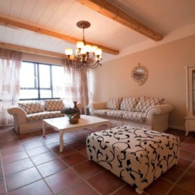 Ceramic floor in a room with wooden ceiling