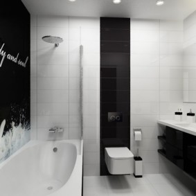 Toilettes suspendues blanches sur carrelage noir