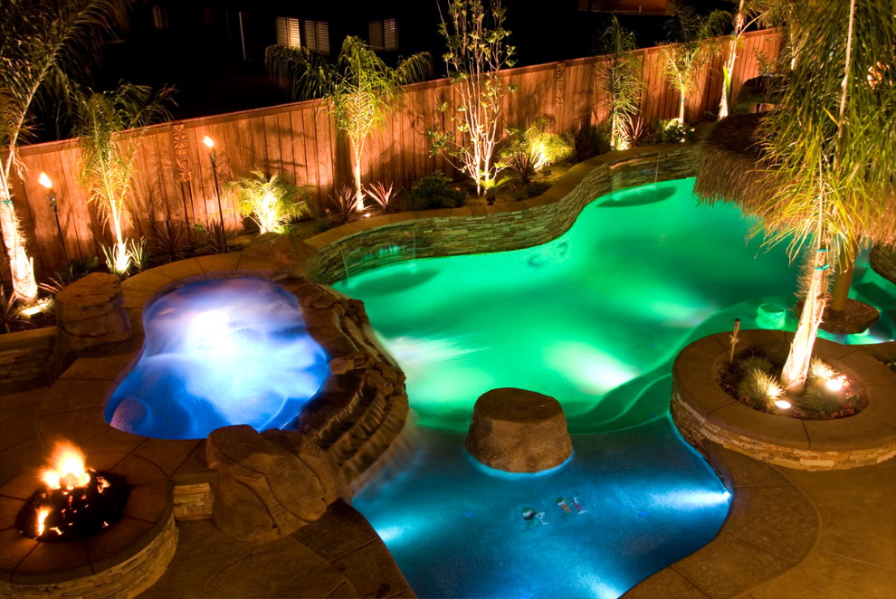 Color illumination of ponds near a wooden fence