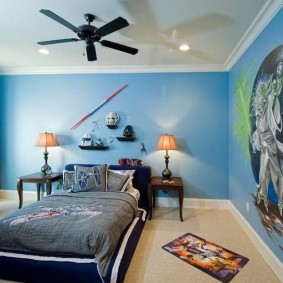 Black fan on a white ceiling