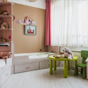 Pink curtains in a nursery