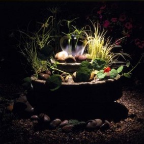 Garden fountain with decorative lighting