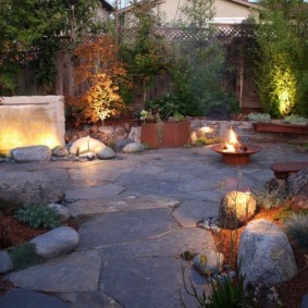 An open hearth on a site deep in the garden