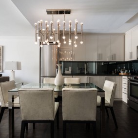 Stylish chandelier over the dining table