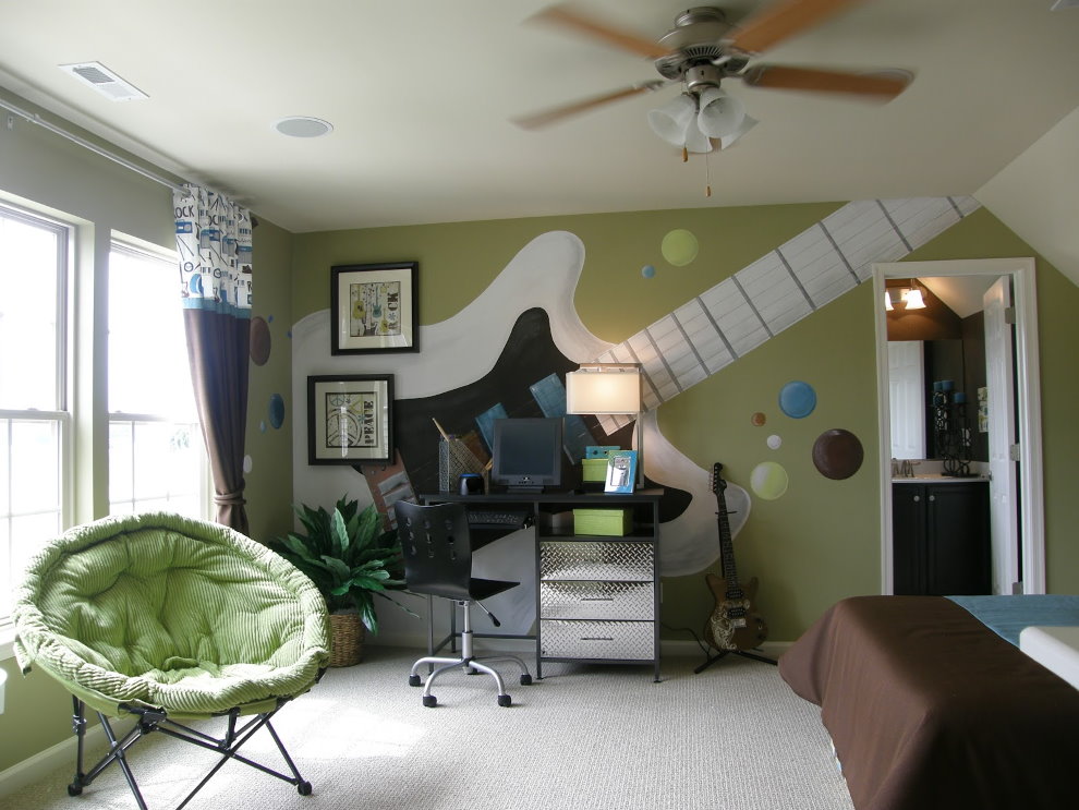 Guitar on the wall of a nursery for a teenage boy