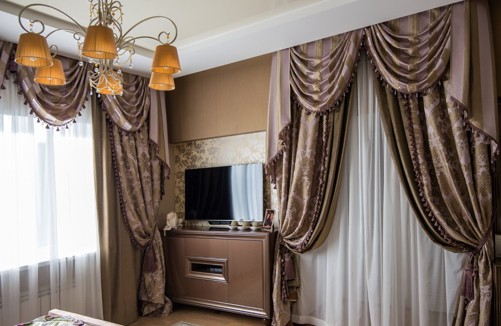 Velvet curtains with soft pelmet on the hall windows