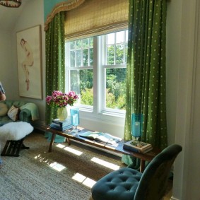 Green curtains on a window in a private house