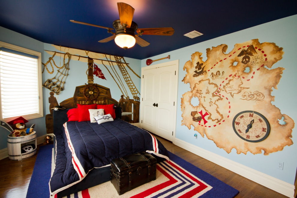 Map with treasure island on the wall of a room for a boy