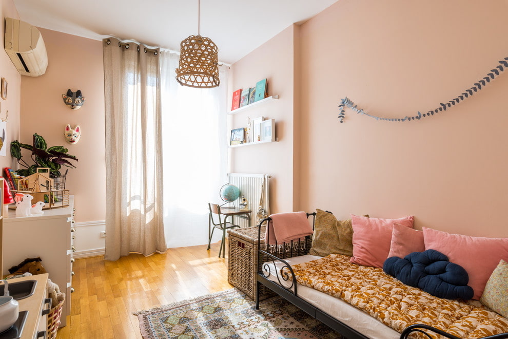 Pink walls in a schoolgirl's room