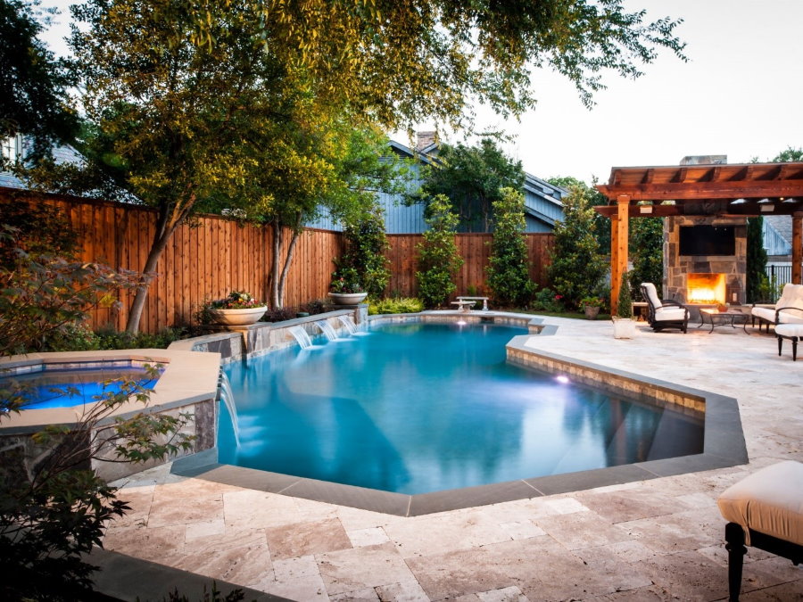 Tall trees above the pool in the courtyard