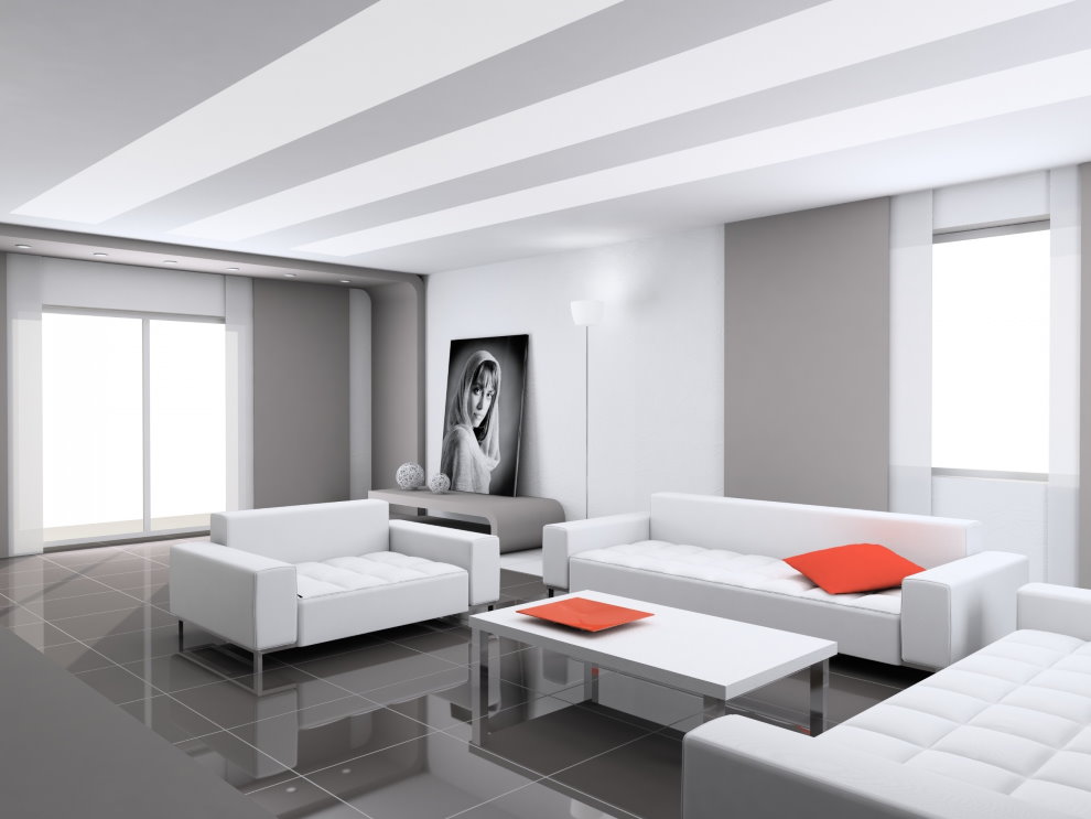 Mobilier blanc sur le sol gris d'un salon high-tech