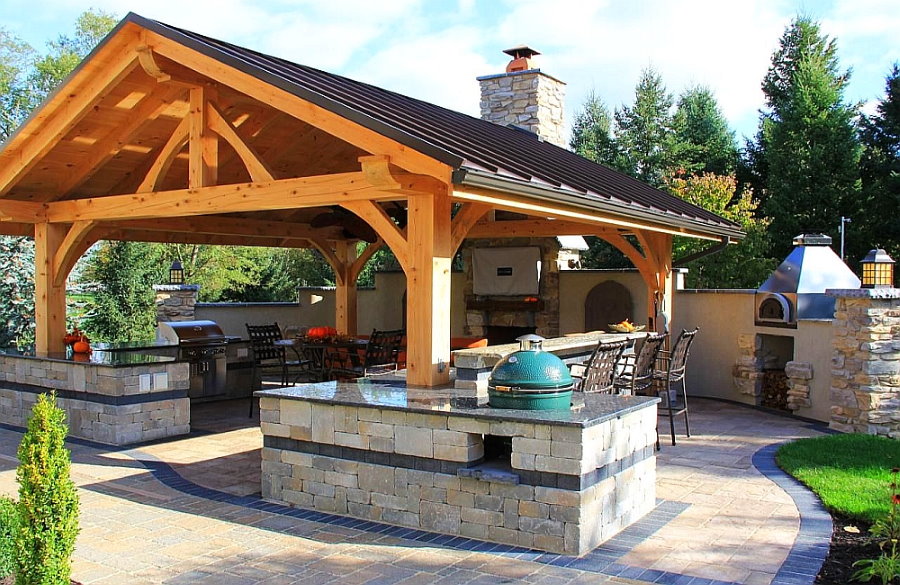 Wooden arbor on stone supports