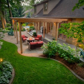 Wooden pergola in a recreation area at the cottage