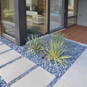 Flowerbed in front of a private house entrance