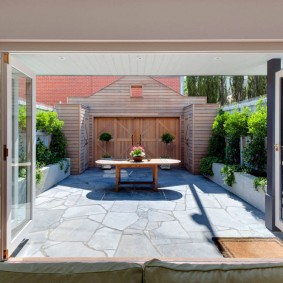 Sliding glazing walls in the living room of a private house