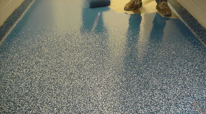 Filling of a bulk floor of epoxy type