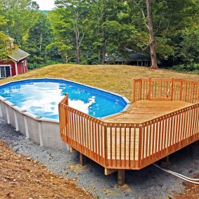 Wooden platform in front of the frame pool