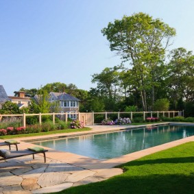 Garden deck chairs on a stone platform