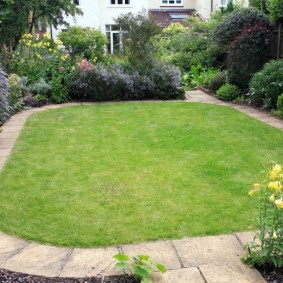 Concrete path around the ground