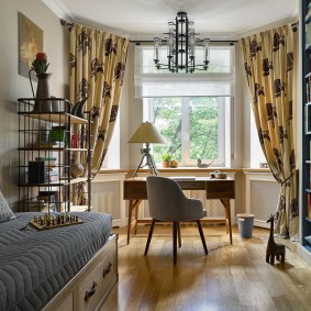 Stylish table in front of a children's window