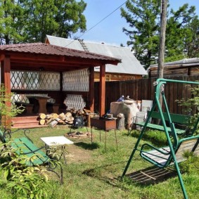 Balançoire de jardin sur châssis métallique