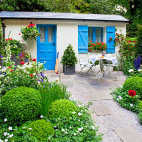 Country house with blue shutters