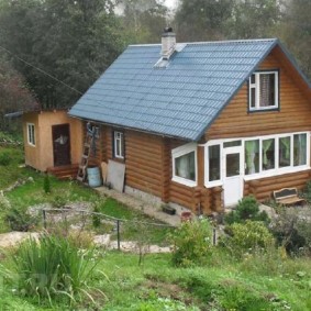 Log house on a slope plot